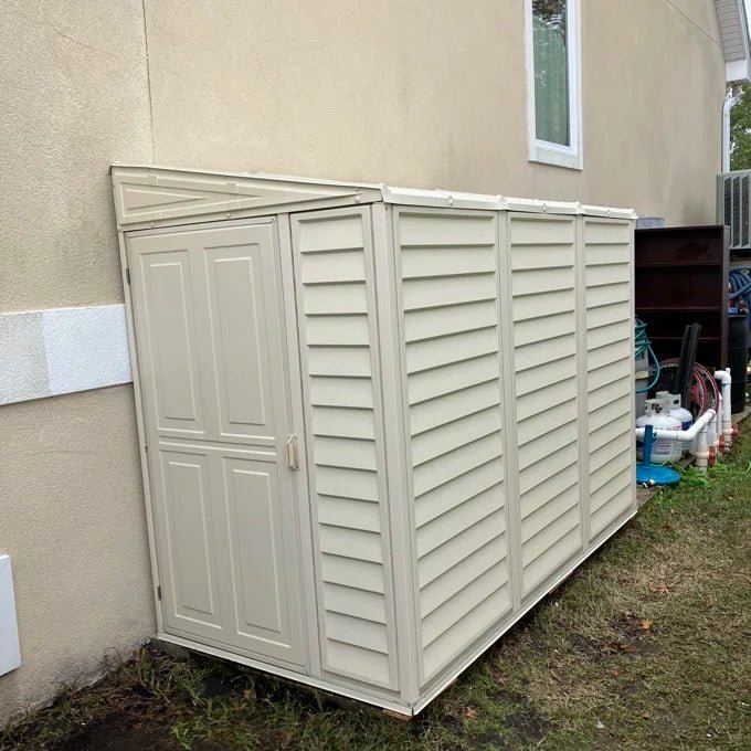 Duramax SideMate 4x8 shed installed next to a house