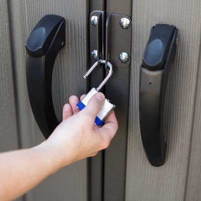 Lockable steel door with padlock latch